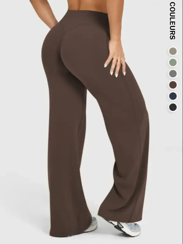 Pantalon de sport large décontracté pour femme, choix parfait pour l'automne et l'hiver, design confortable et tendance, idéal pour un usage quotidien.