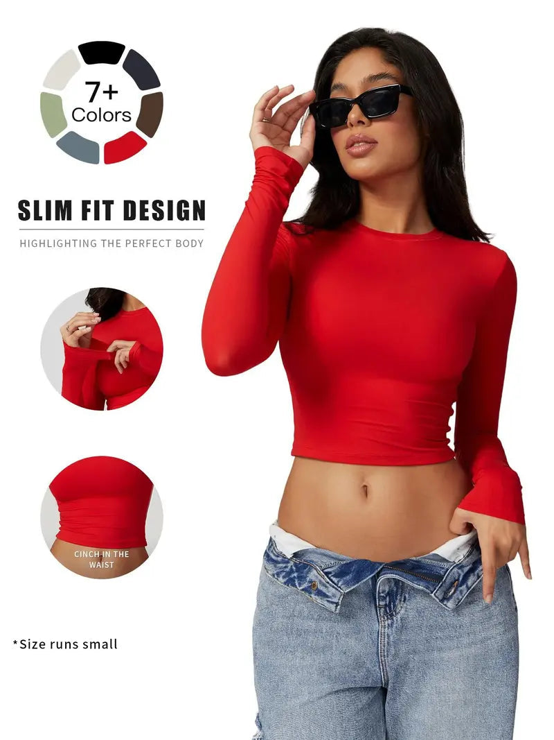 T-shirt de sport à col rond uni et compressif pour femme