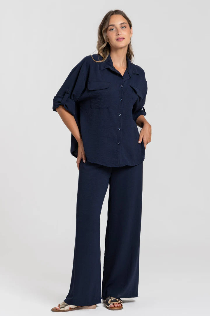 Ensemble deux-pièces : haut ample style chemise, pantalon ample, taille élastique.