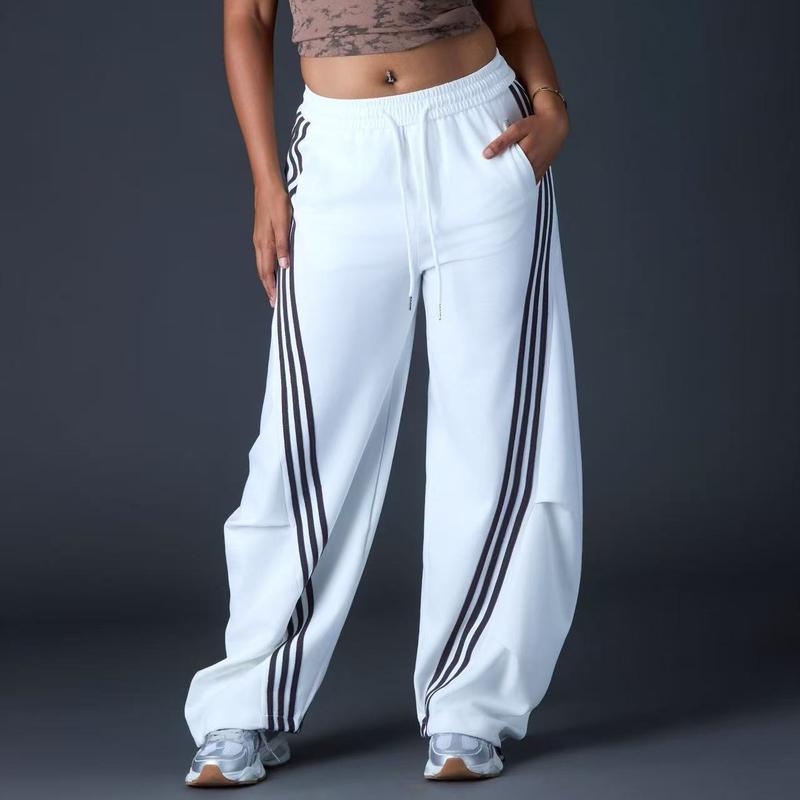 Pantalon de survêtement large et ample rayé pour femme, coupe décontractée, avec taille élastique et poches latérales pour vêtements de sport