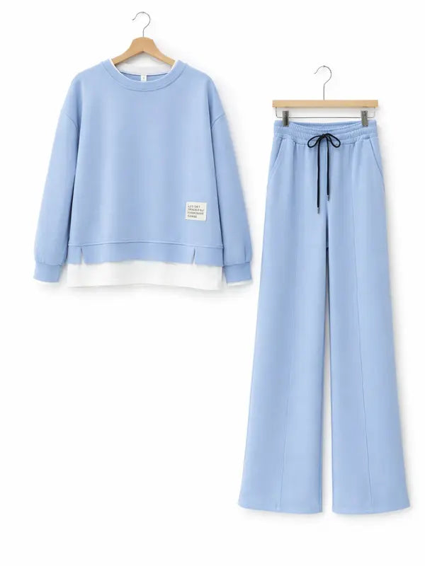 Survêtement pour femme : sweat à capuche et pantalon de survêtement, tenue décontractée, coupe droite simple.