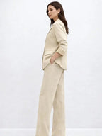 Suede Suit — Featuring a fluid, modern silhouette.