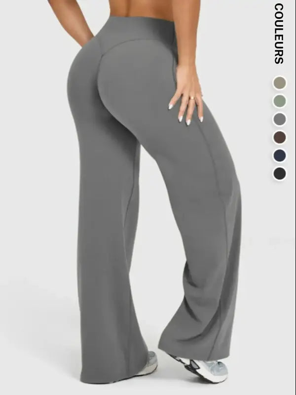 Pantalon de sport large décontracté pour femme, choix parfait pour l'automne et l'hiver, design confortable et tendance, idéal pour un usage quotidien.