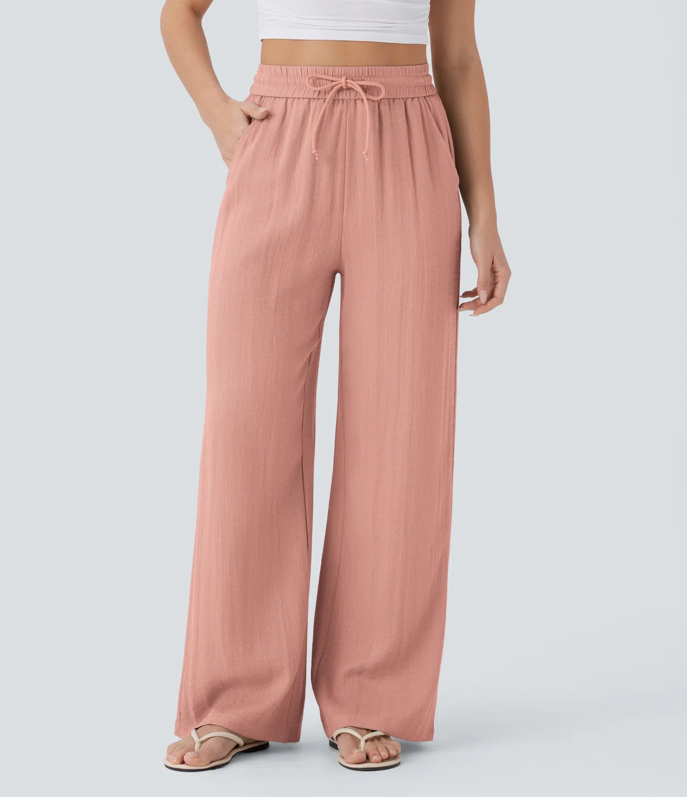 Pantalon ample taille haute en lin avec cordon de serrage et grandes poches
