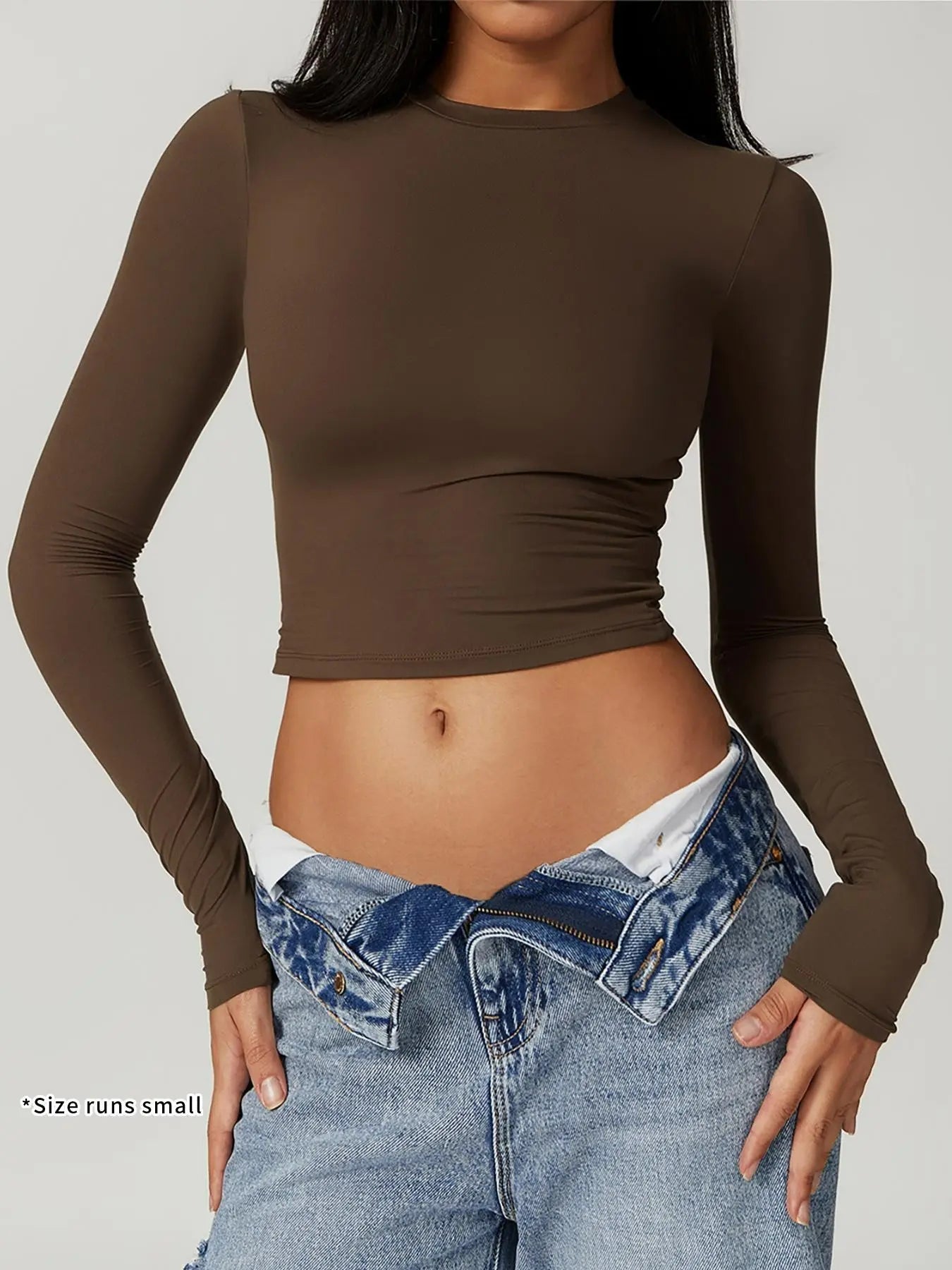 T-shirt de sport à col rond uni et compressif pour femme
