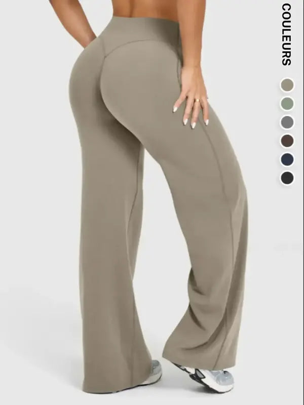 Pantalon de sport large décontracté pour femme, choix parfait pour l'automne et l'hiver, design confortable et tendance, idéal pour un usage quotidien.