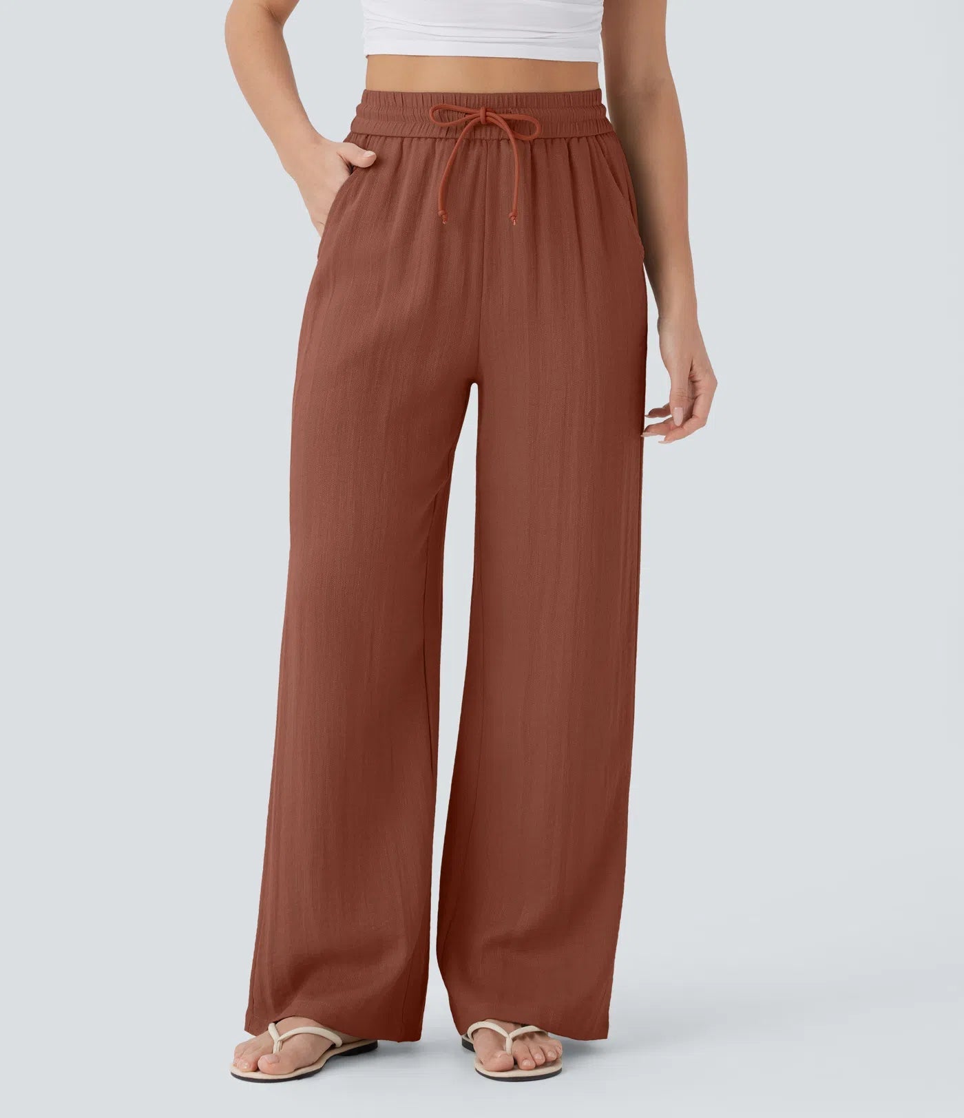 Pantalon ample taille haute en lin avec cordon de serrage et grandes poches