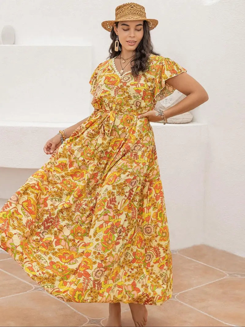 Robe trapèze avec manches papillon, ceinture, ourlet à volants et imprimé floral