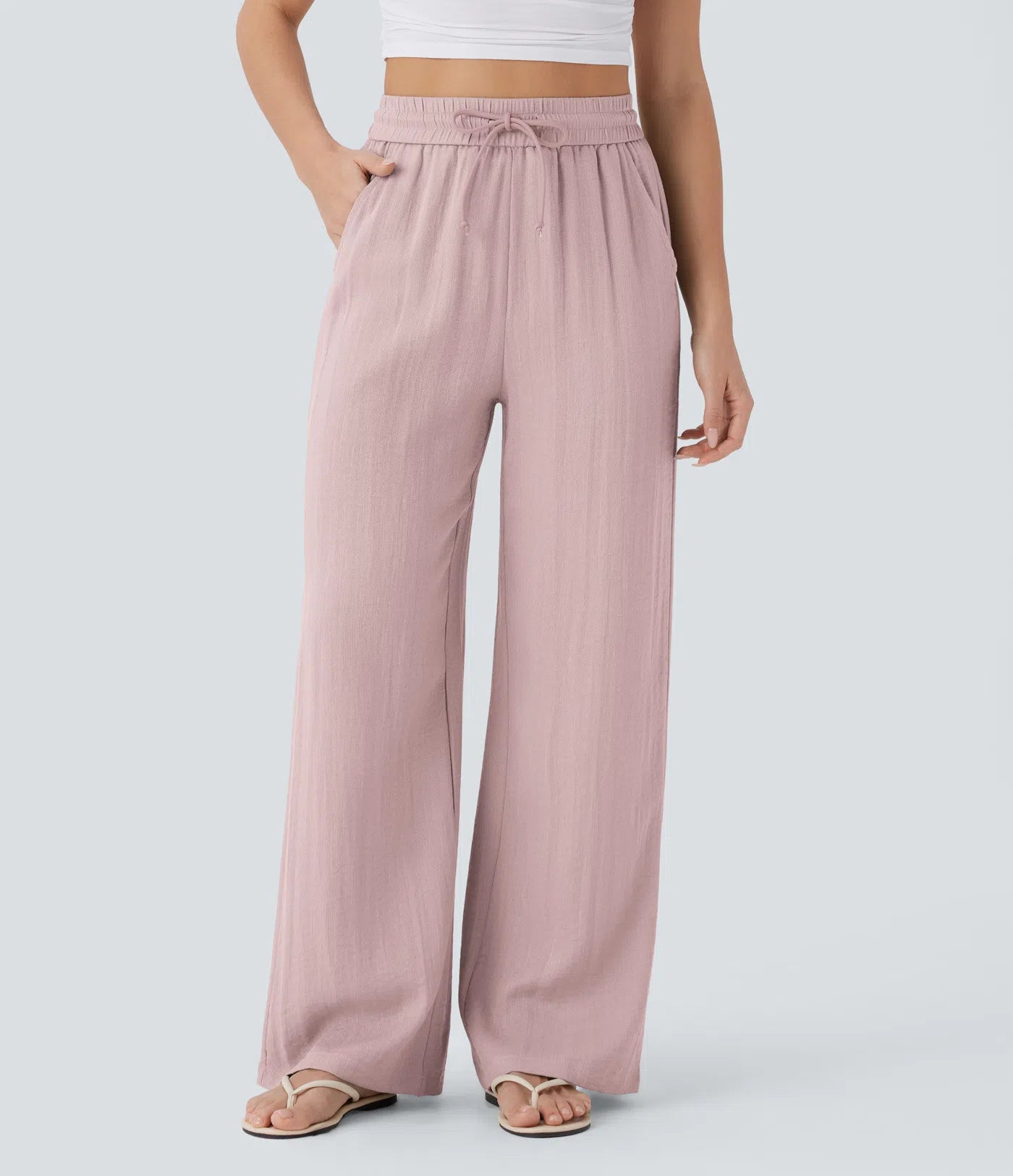 Pantalon ample taille haute en lin avec cordon de serrage et grandes poches