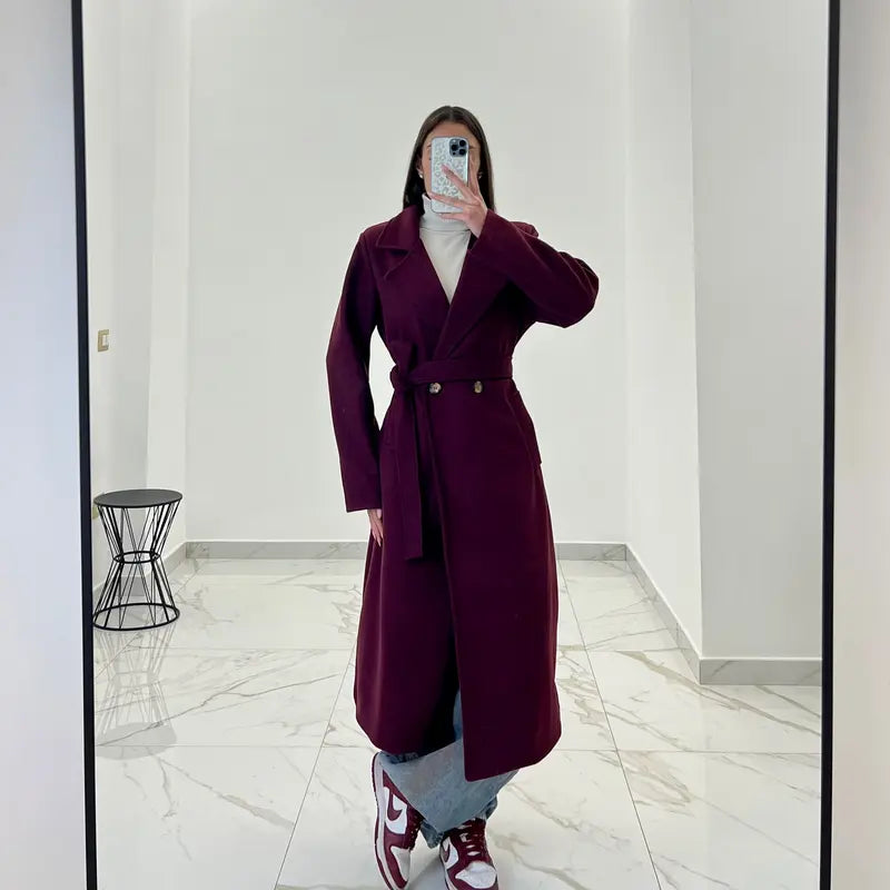 Manteau avec une ceinture à la taille