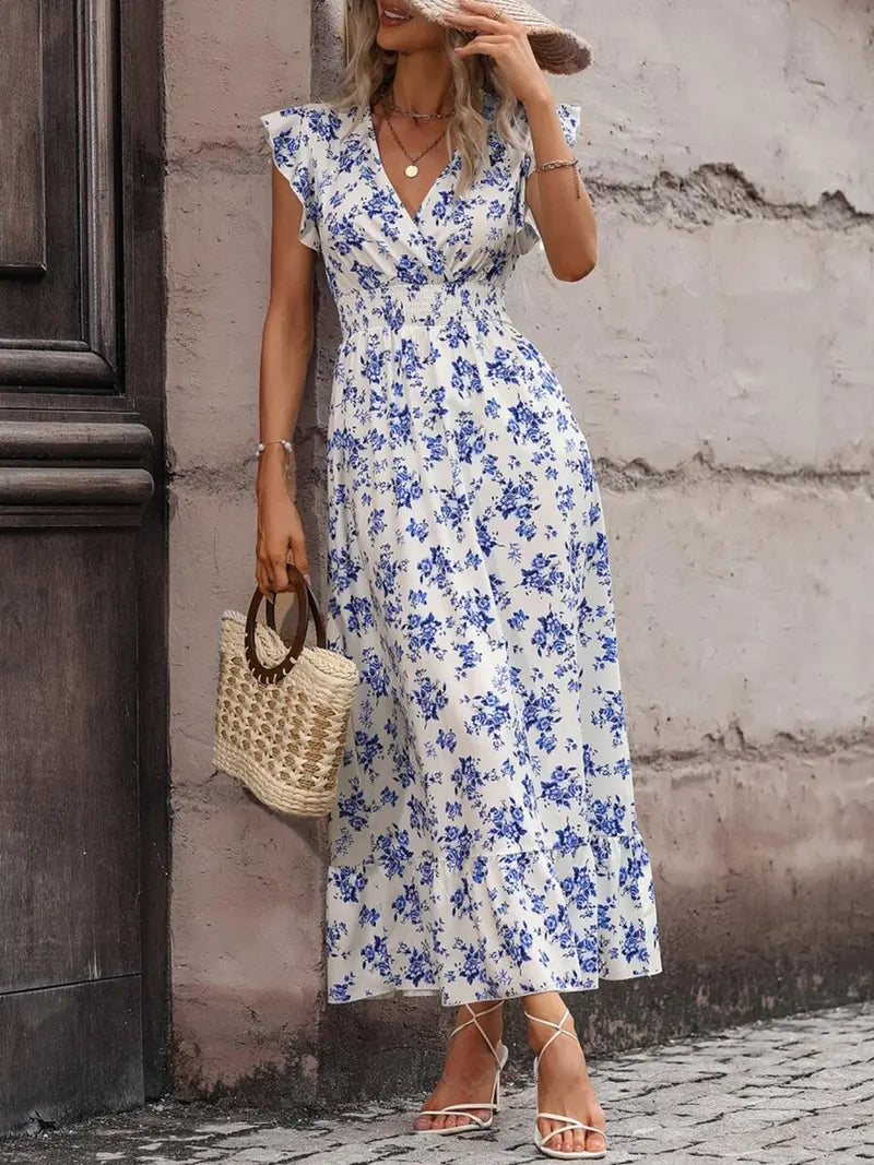 Robe longue fleurie décontractée col V, taille volantée, style bohème chic, manches courtes et ajustées, idéale pour les vacances printemps-été.