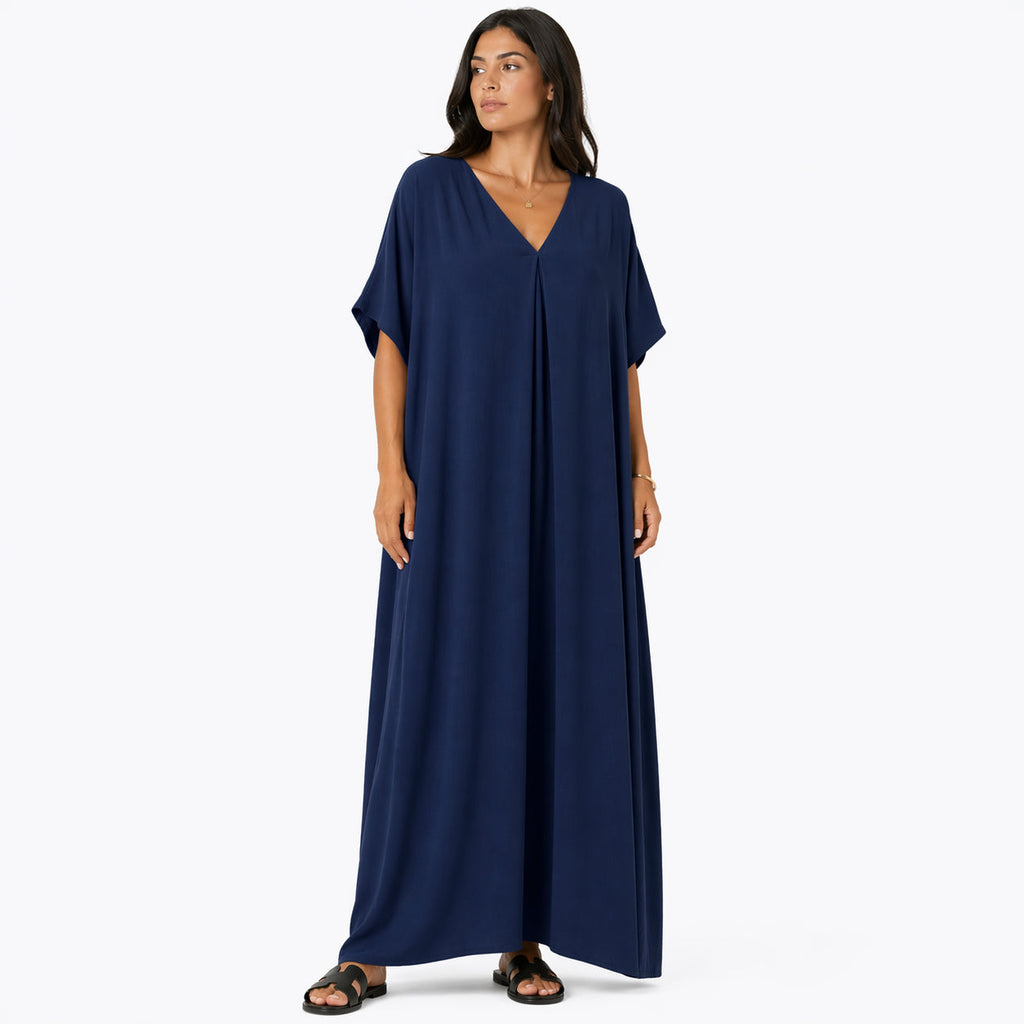 Women's long, flowy, oversized V-neck dress – chic and comfortable for summer.