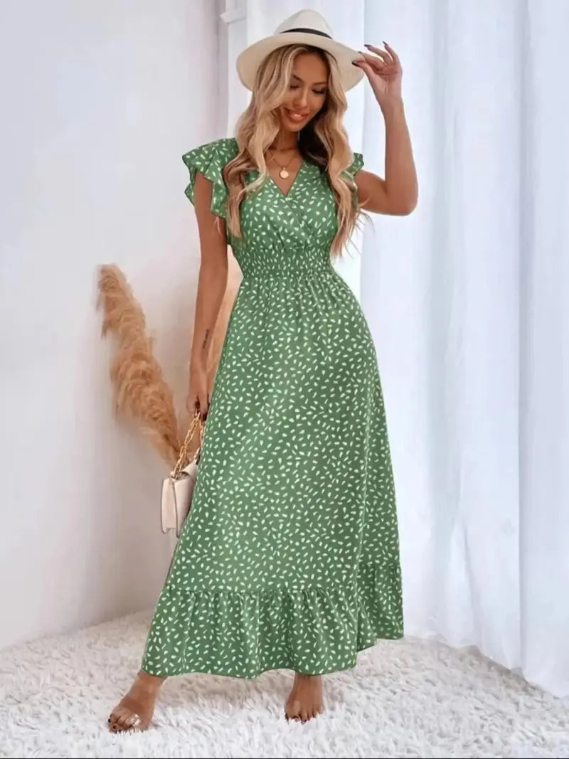 Robe longue fleurie décontractée col V, taille volantée, style bohème chic, manches courtes et ajustées, idéale pour les vacances printemps-été.