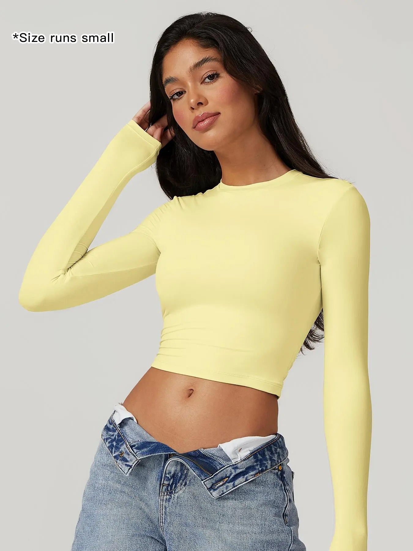 T-shirt de sport à col rond uni et compressif pour femme