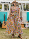 A-line dress with butterfly sleeves, belt, ruffled hem, and floral print