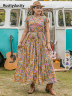 A-line dress with butterfly sleeves, belt, ruffled hem, and floral print