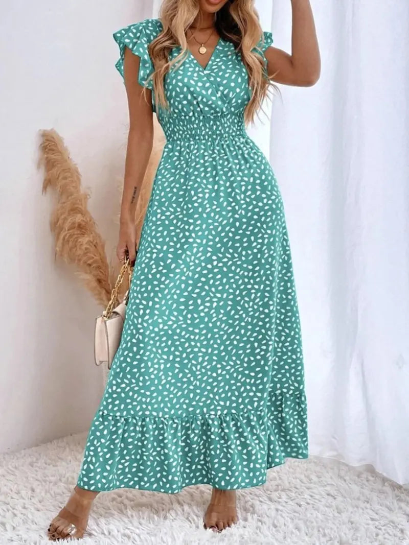 Robe longue fleurie décontractée col V, taille volantée, style bohème chic, manches courtes et ajustées, idéale pour les vacances printemps-été.
