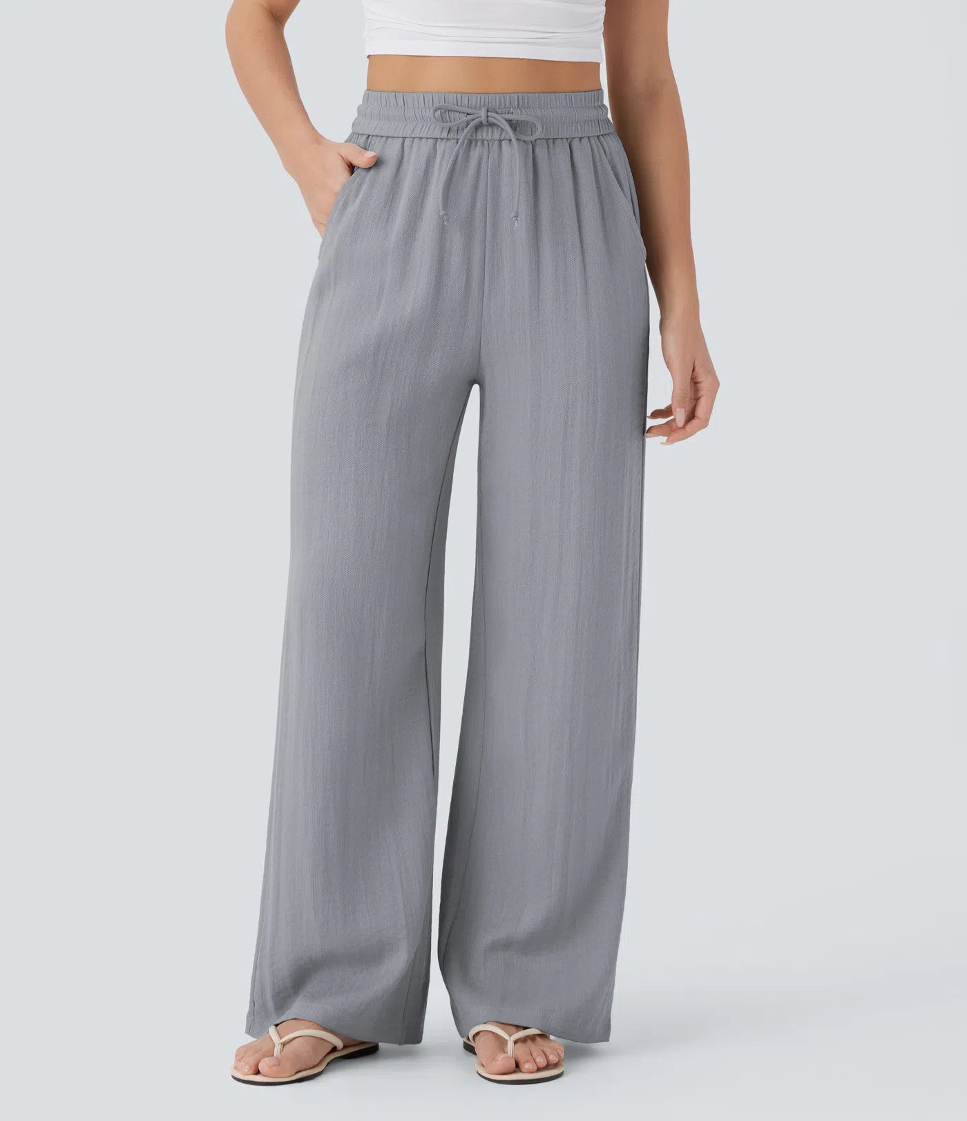 Pantalon ample taille haute en lin avec cordon de serrage et grandes poches