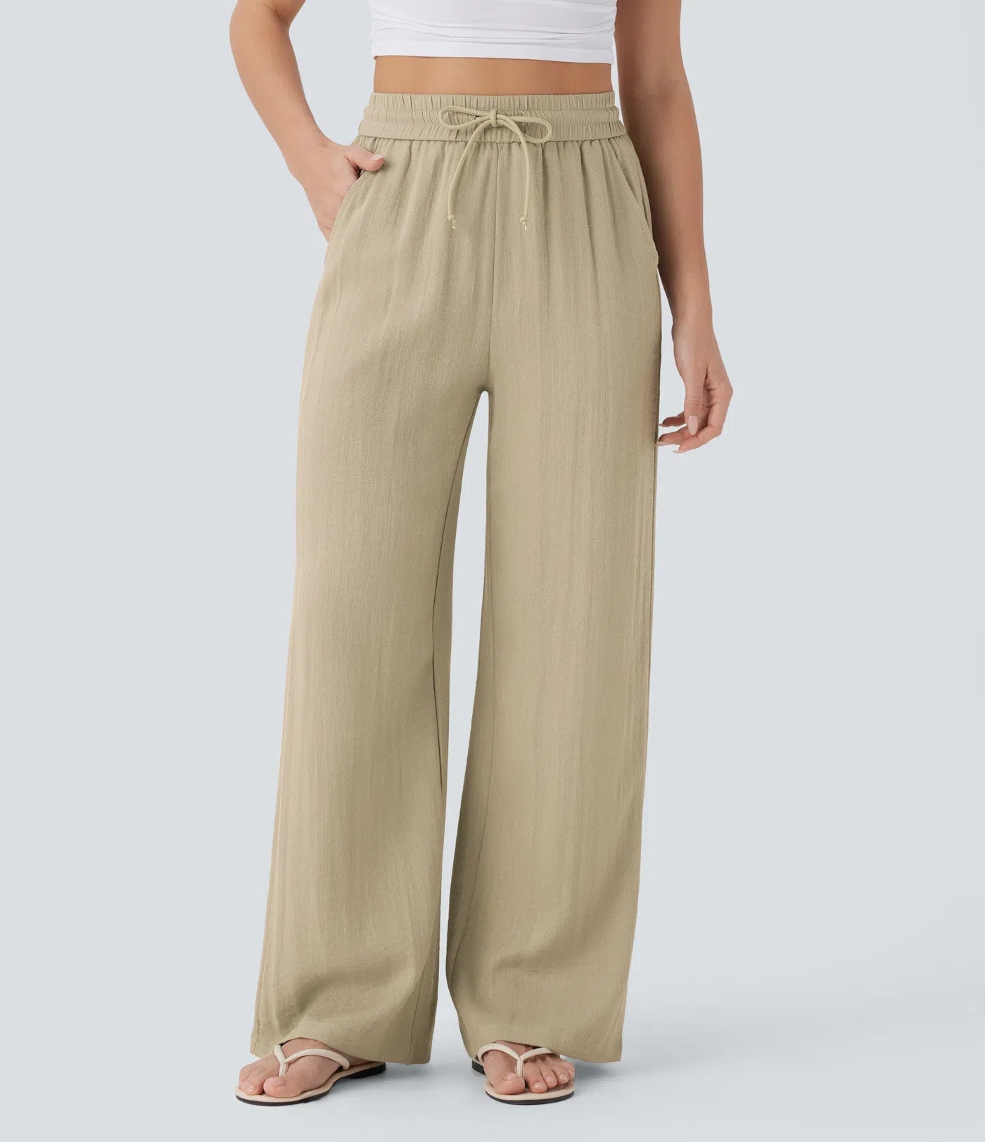 Pantalon ample taille haute en lin avec cordon de serrage et grandes poches
