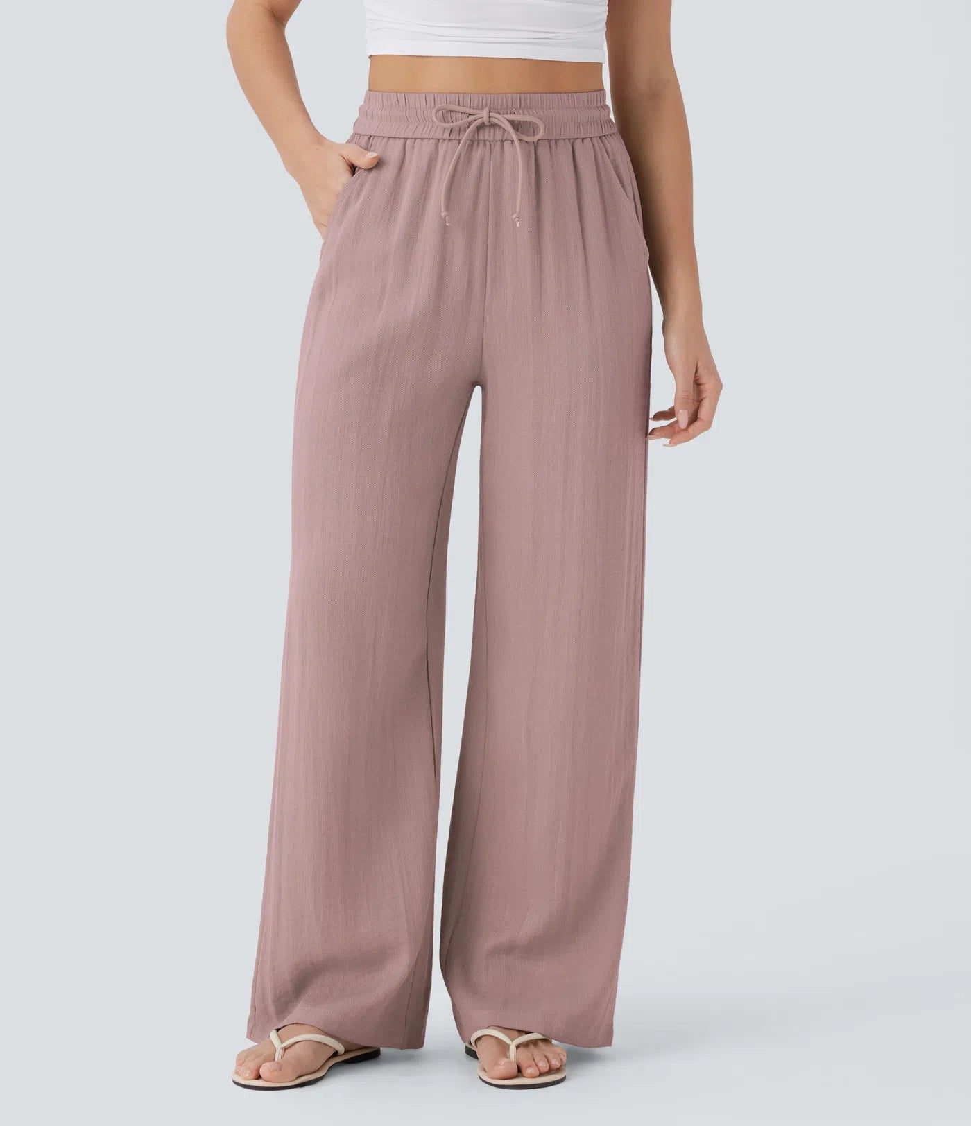 Pantalon ample taille haute en lin avec cordon de serrage et grandes poches